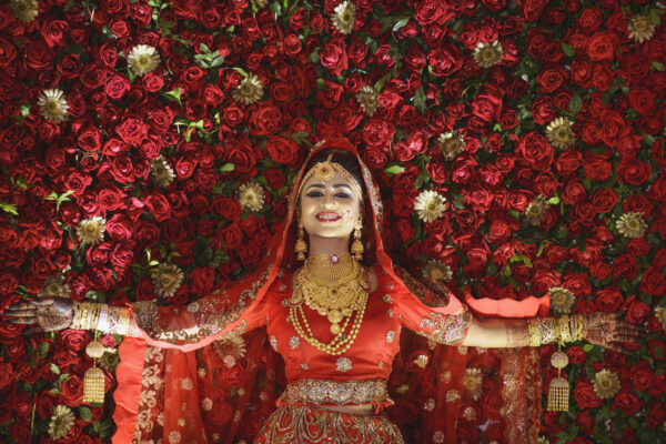 Woman in beautiful rose background